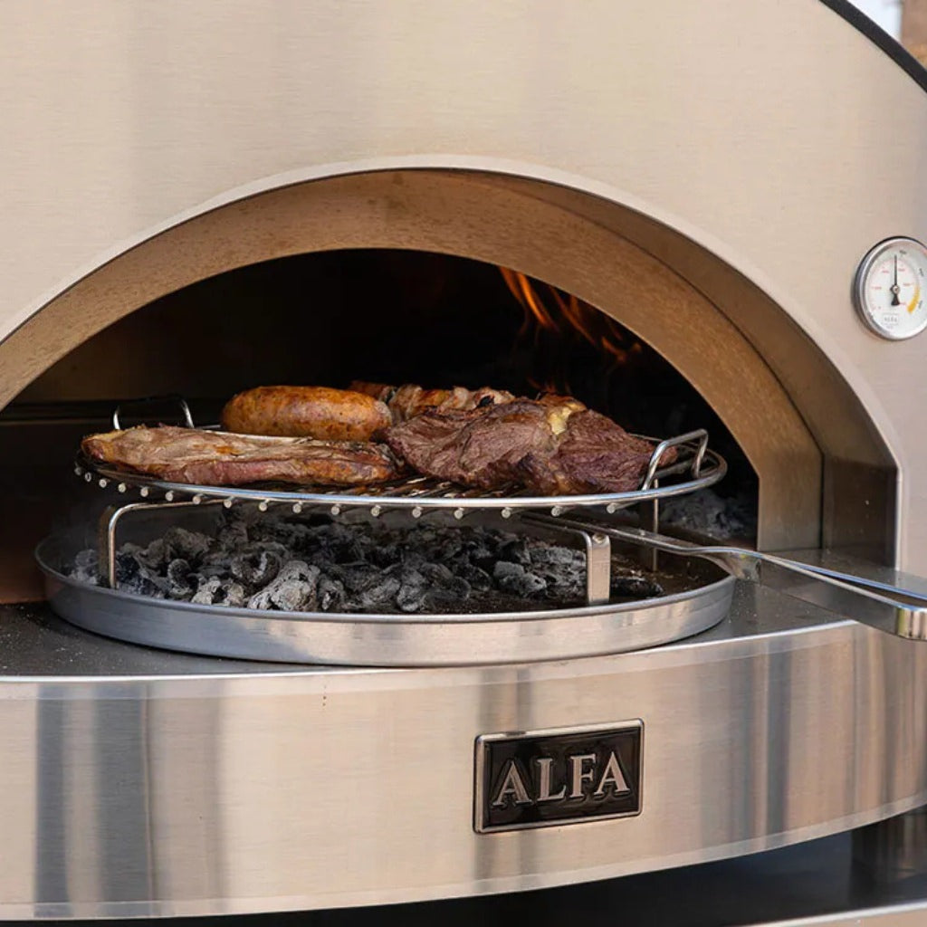 Alfa Forni BBQ in a an Alfa wood-fired oven with meats cooking inside.