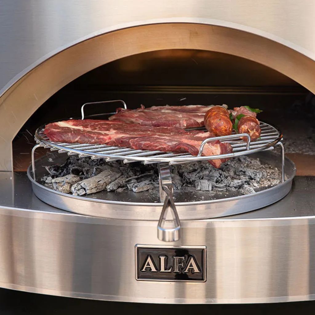Alfa Forni BBQ in a stainless steel Alfa pizza oven, cooking meats over hot embers.