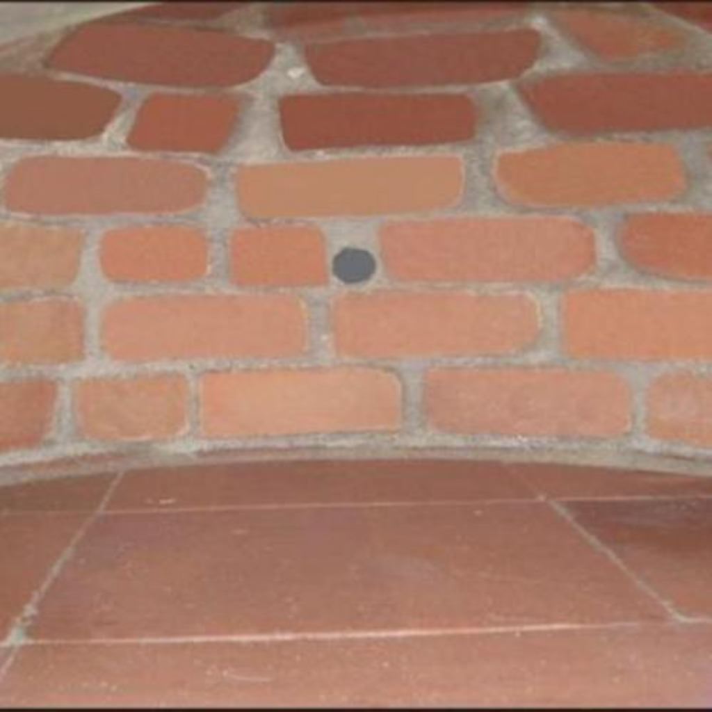 Authentic Pizza Ovens Premium Lisboa Stone Finish Countertop Wood Fired Pizza Oven Inside View of Oven Where Rotisserie Spit Connects to Back of Oven