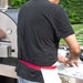 Man preparing pizza dough in outdoor kitchen next to his Alfa Forni Classico 2 Pizze Oven