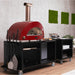 Alfa Cooking Station in outdoor kitchen with gas pizza oven on a 160 stand with cooking utensils.