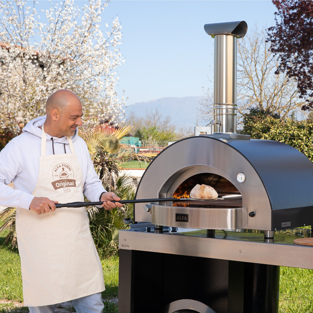 Alfa Forni Classico 4 Pizza Oven on Pizza Preparation Table Baking Bread In Outdoor Kitchen