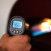 Alfa Laser Thermometer being used to check pizza oven cooking surface temperature