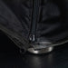 Alfa Moderno Portable Pizza Oven Cover close-up of a black zipper to the feet on a textured surface