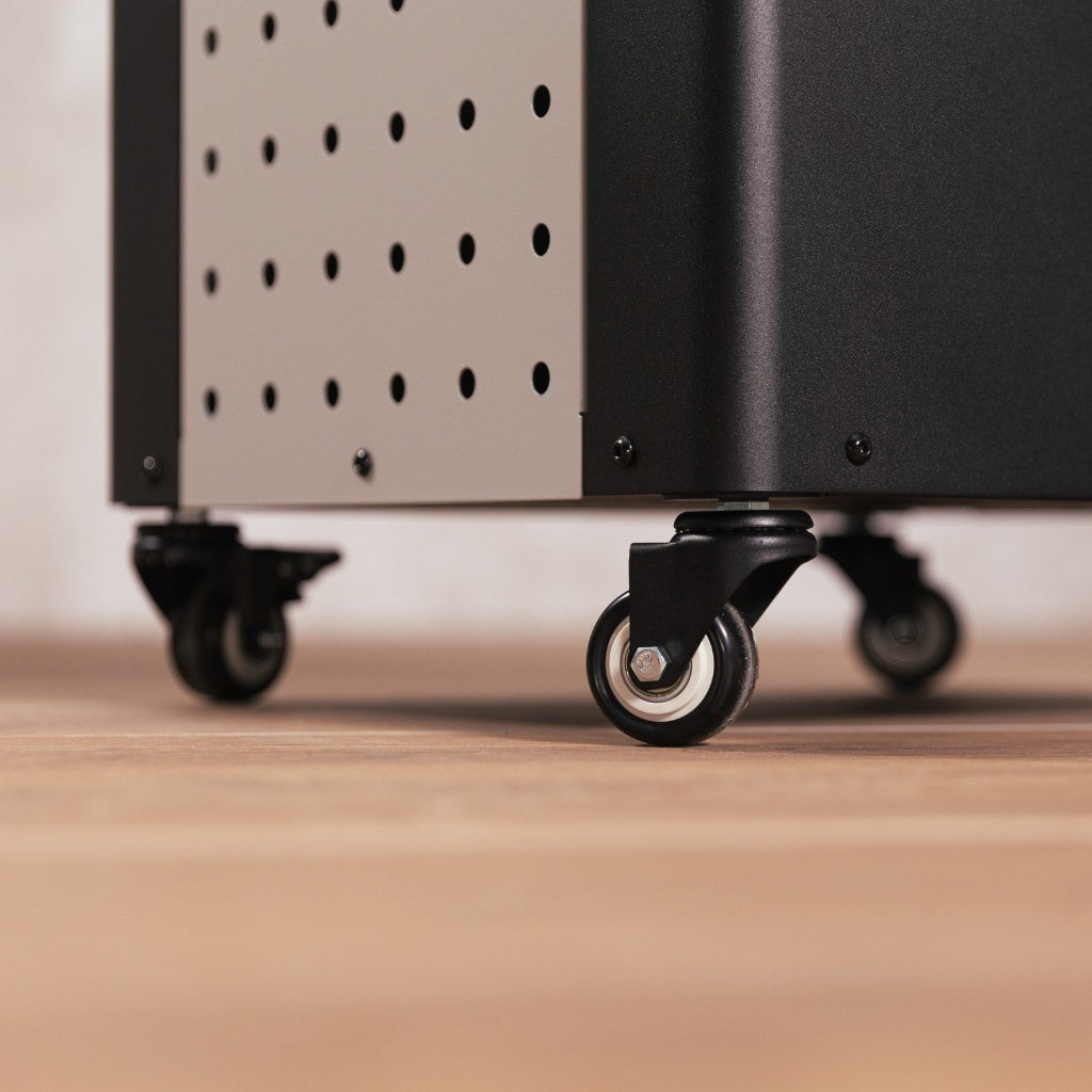 Alfa Pizza Peel Holder close-up of cart with wheels on a wooden floor.