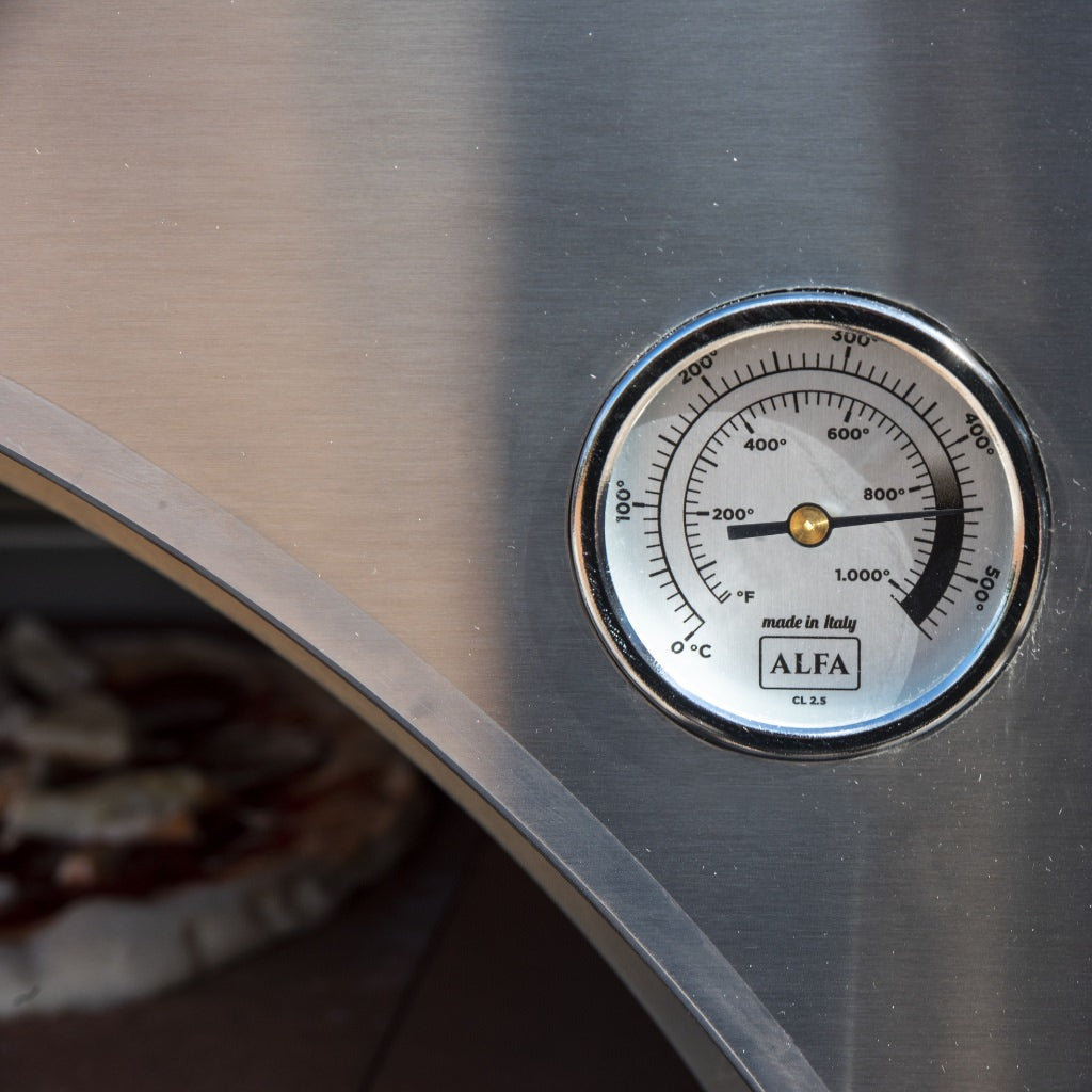 Close up view of the Alpha Classico 2 Pizze Gas Oven built in thermometer while cooking pizza in the oven