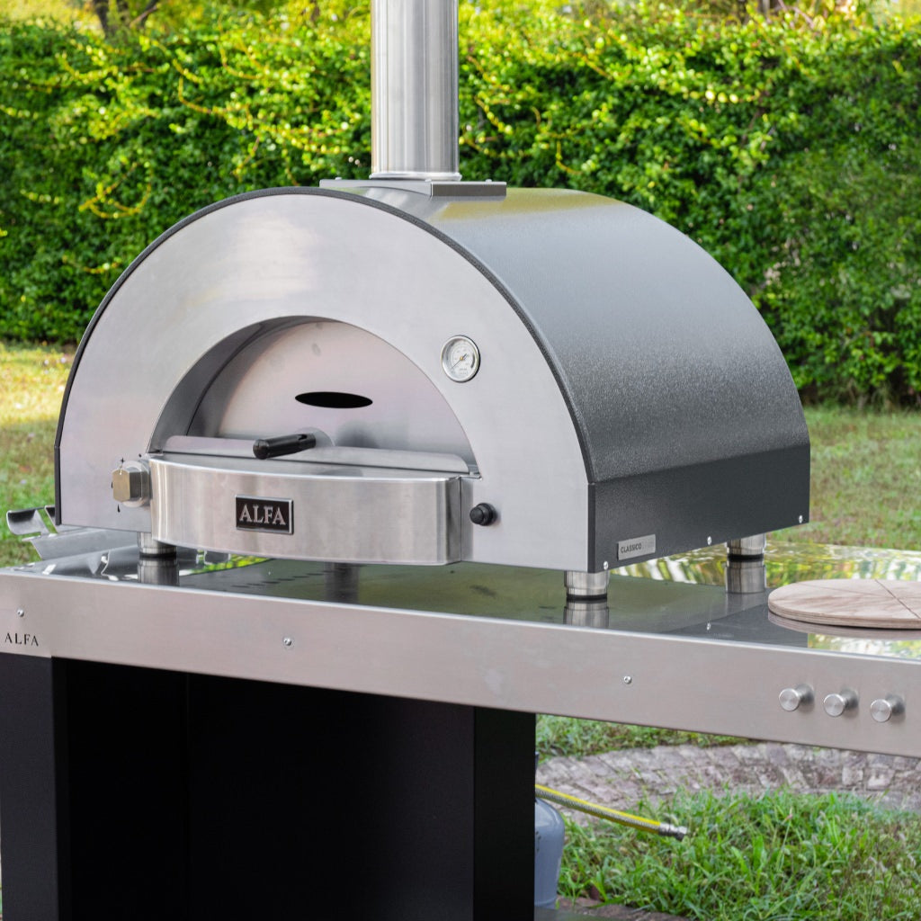 Forno Alfa Classico 2 Pizze pizza oven on stainless steel preparation table in backyard