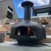 Polito Giotta Pizza Oven with fire burning inside oven