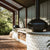 Polito Giotta Pizza Oven on custom brick base with cement countertop in outdoor kitchen with grill