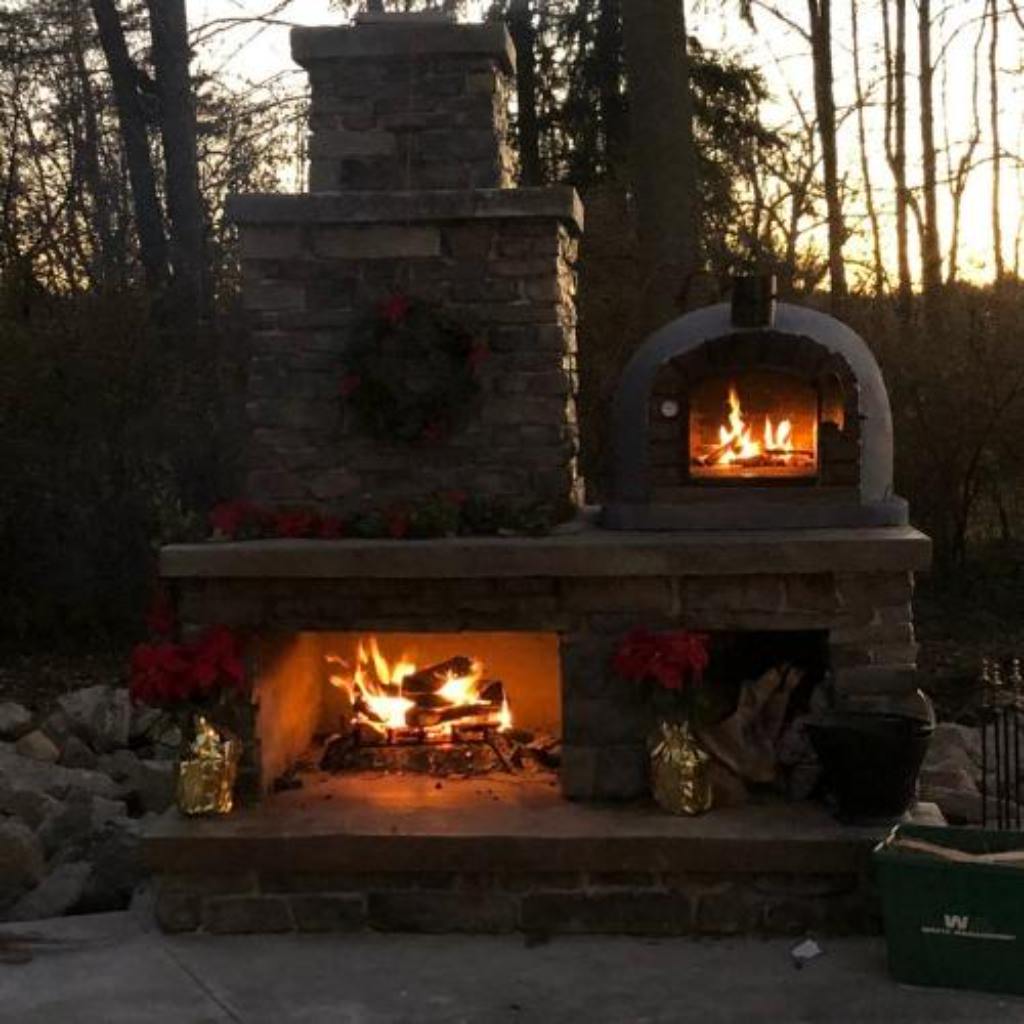https://propizzaovens.com/cdn/shop/products/Authentic_Pizza_Ovens_Lisboa_Countertop_Wood_Fired_Pizza_Oven_Christmas_Patio.jpg?v=1608564927