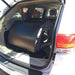 Authentic Pizza Ovens Maximus Arena Countertop Wood Fired Pizza Oven in Black in Back of Car