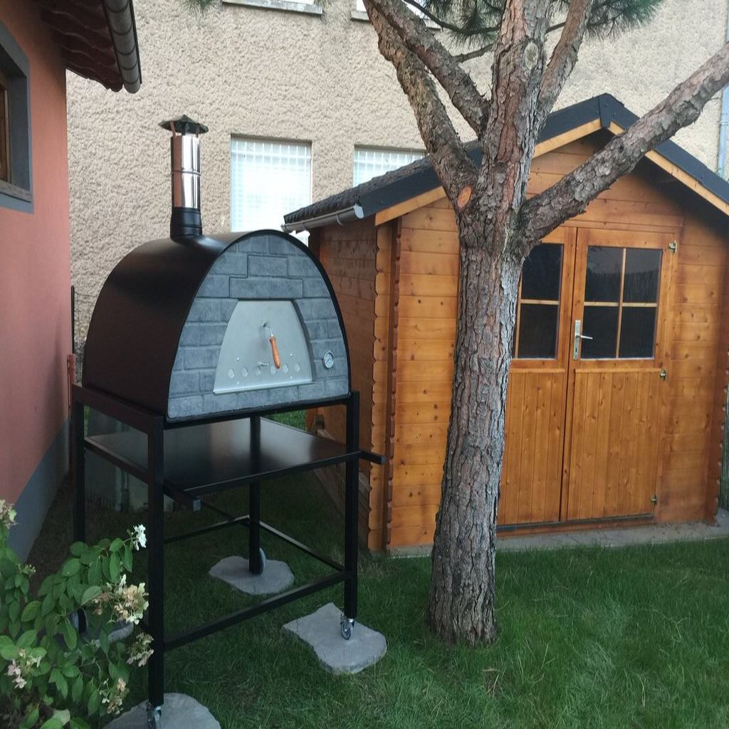 Authentic Pizza Ovens Maximus Prime Countertop Pizza Oven Stand in Black in Backyard with Pizza Oven on Top