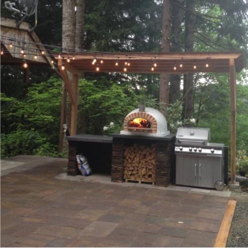 Authentic Pizza Ovens Pizzaioli Countertop Wood Fired Pizza Oven in Custom Built Outdoor Kitchen