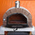 Authentic Pizza Ovens Premium Buena Ventura Red Brick Countertop Wood Fired Pizza Oven with Door Open and Bricks Inside