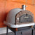 Authentic Pizza Ovens Premium Buena Ventura Red Brick Countertop Wood Fired Pizza Oven on Pizza Oven Stand Outside