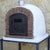 Authentic Pizza Ovens Premium Ventura Red Brick Countertop Wood Fired Pizza Oven in Backyard on Black Stand Right Side View