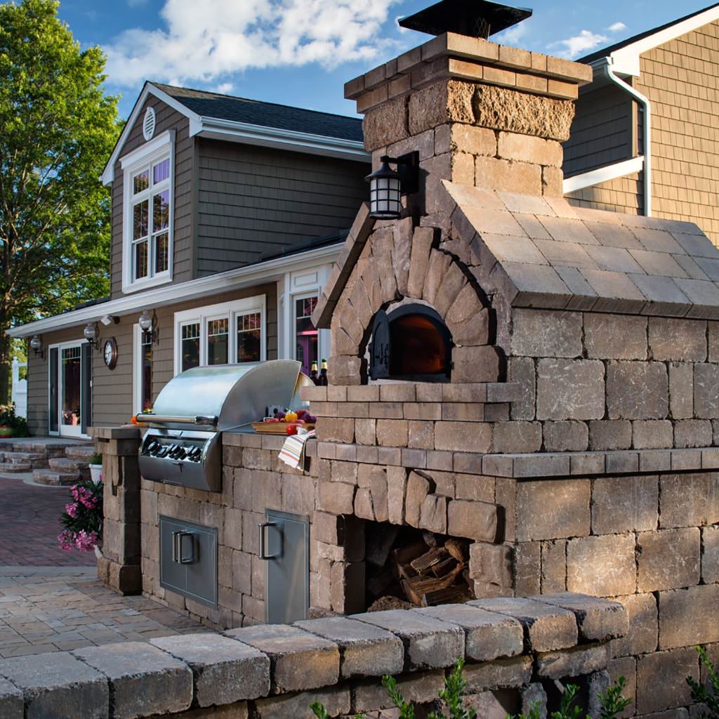 Chicago Brick Oven CBO 1000 Commercial Wood Fired Pizza Oven Kit Residential Back Patio Installation with Grill in Summer