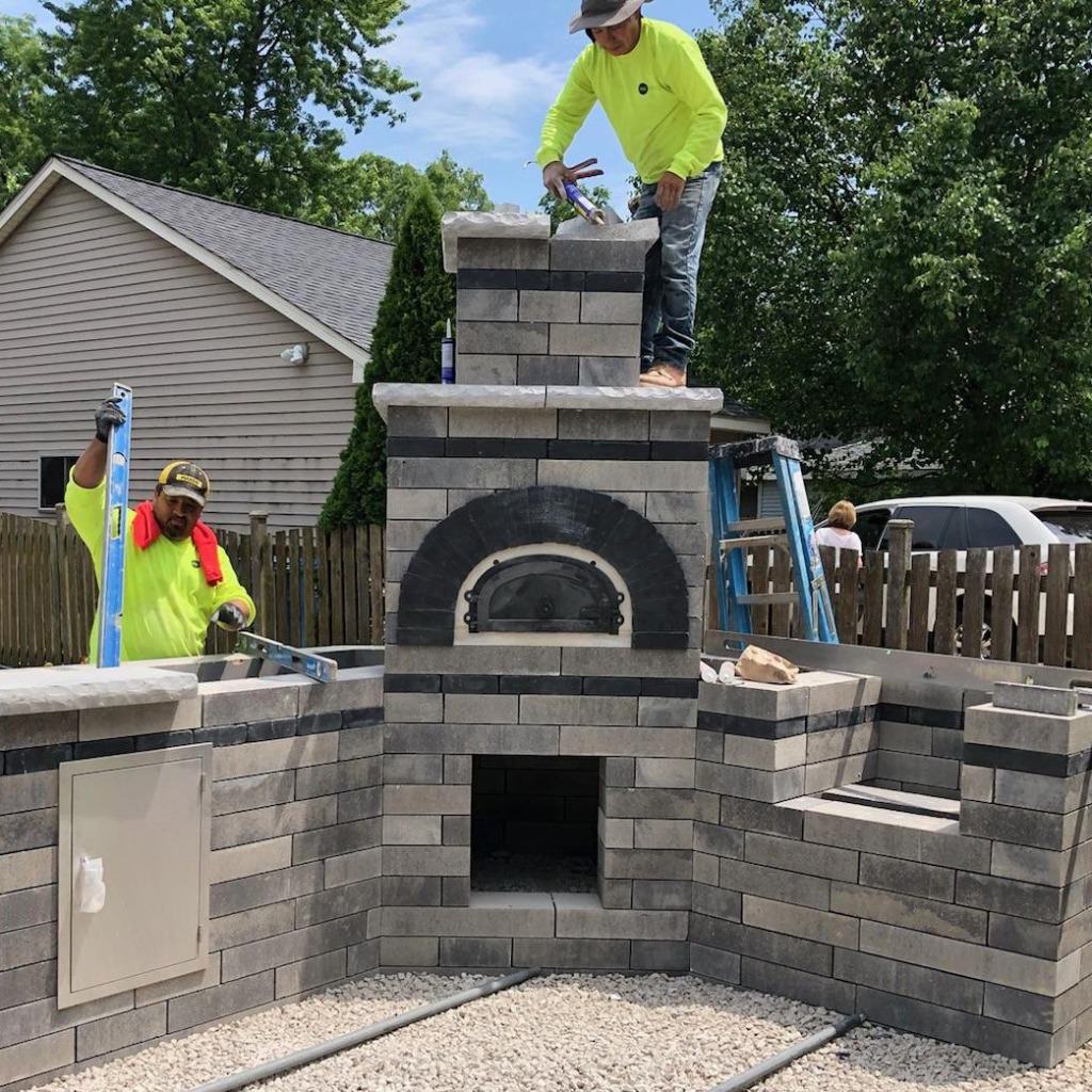 Chicago Brick Oven CBO 1000 Commercial Wood Fired Pizza Oven Kit Outdoor Patio Installation with Crew Working