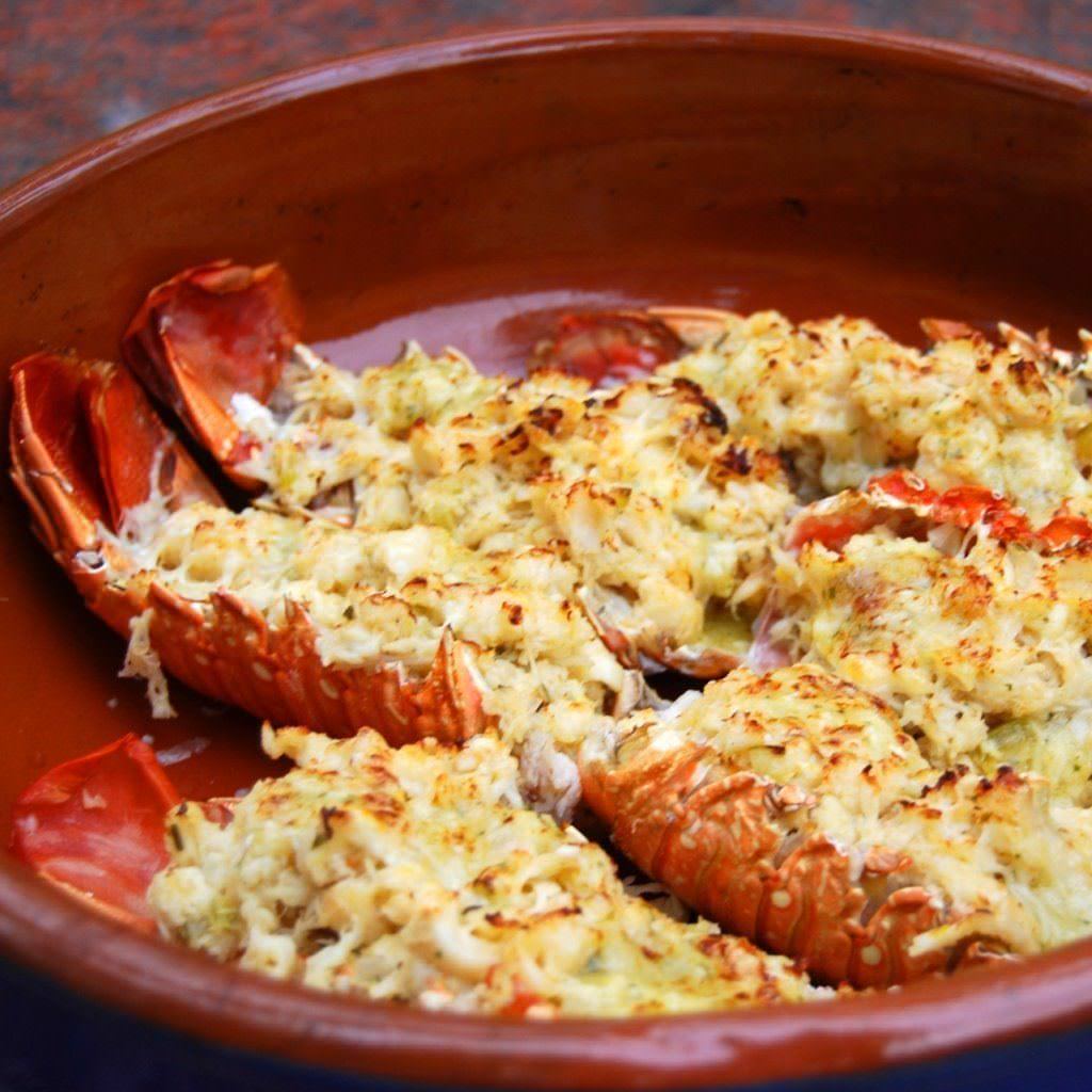 Chicago Brick Oven CBO 500 Countertop Wood Fired Pizza Oven Cooked Lobster Tail with Cheese in Clay Bowl