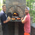 Chicago Brick Oven CBO 500 Wood Fired Pizza Oven Kit Cooking Sausage and Peppers with Father and Son