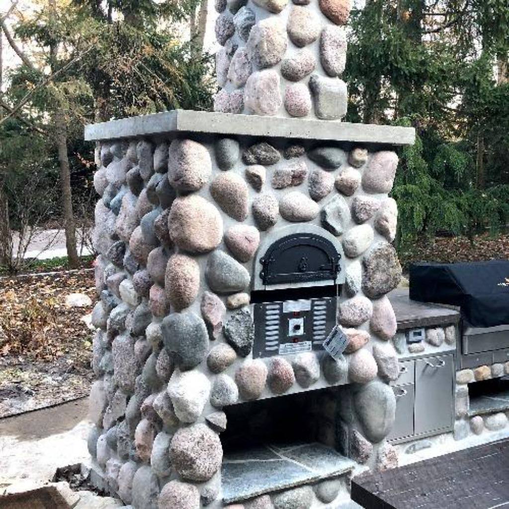 Chicago Brick Oven CBO 750 Hybrid Gas and Wood Fired Pizza Oven DIY Kit Custom River Rock Home Outdoor Kitchen Installation with Grill and Fireplace