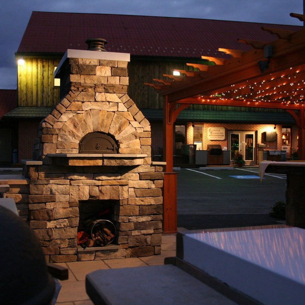 Chicago Brick Oven CBO 750 Wood Fired Pizza Oven DIY Kit in Commercial Restaurant Outdoor Stone Back Patio with Pergola