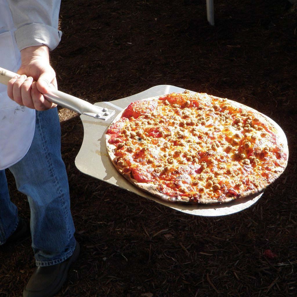Chicago Brick Oven CBO 750 Wood Fired Pizza Oven DIY Kit Cooked Pizza on a Pizza Peel