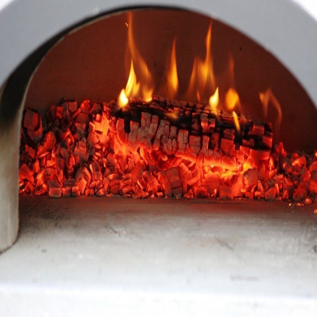 Chicago Brick Oven Hybrid Stand CBO 750 Freestanding Gas and Wood Fired Pizza Oven with Fire Inside Oven and Wood Embers